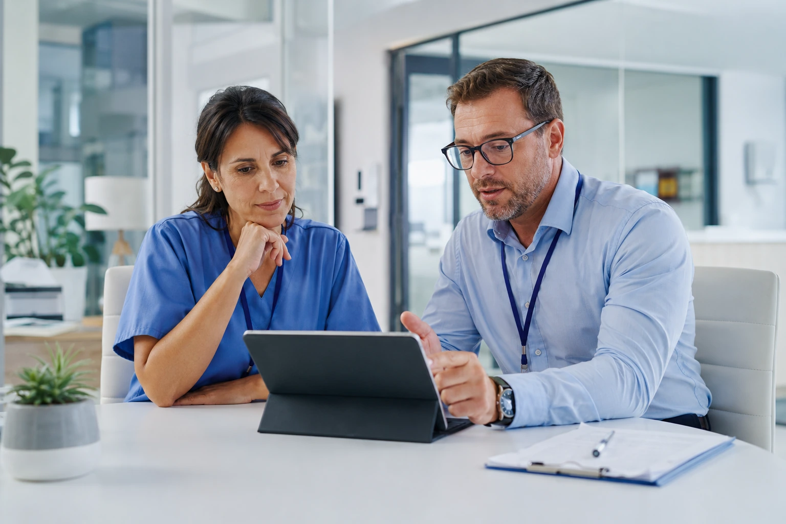 Healthcare professionals discussing information security